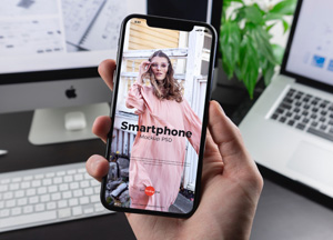 Free Man Holding Smartphone Mockup PSD 2019 smartphone 