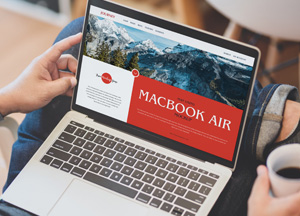 Free Man Using MacBook Air Mockup macbook air 