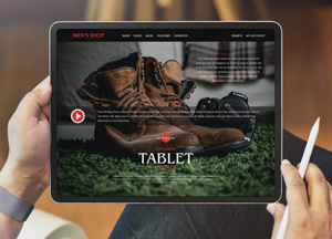 Free Man Using Tablet Mockup PSD mens shop tablet 