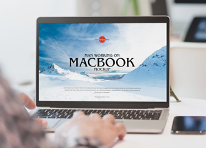 Free Man Working on MacBook Mockup man worino on  mockuf 