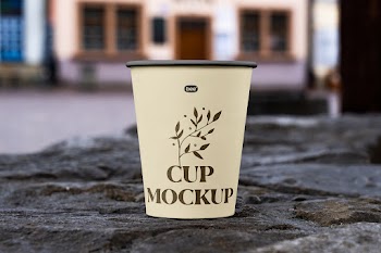 Free Open Paper Cup on Wall Mockup