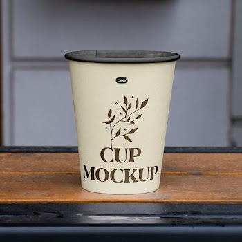 Free Paper Cup on Railing Mockup