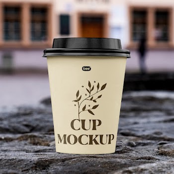 Free Paper Cup on Stone Wall Mockup