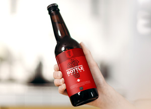 Free Person Holding Bottle Mockup bottle 