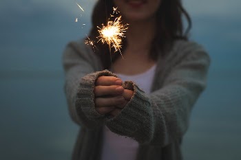 Free person holding sparkler image, | Free Photo - rawpixel