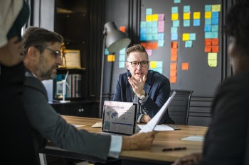 Free Photo of analyzing, businessman, businesswoman