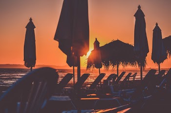 Free Photo of beach, sunset, chair