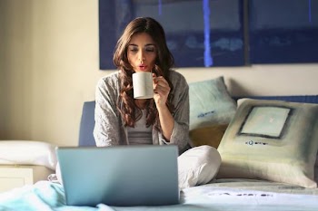 Free Photo of bed, coffee, laptop