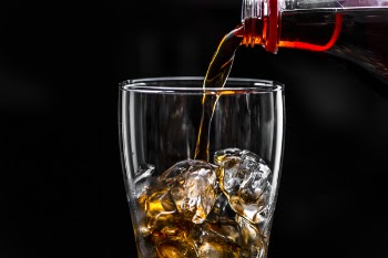 Free Photo of beverage, black background, bottle