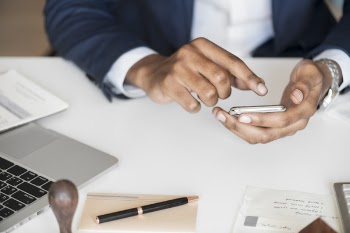 Free Photo of black, businessman, cellphone