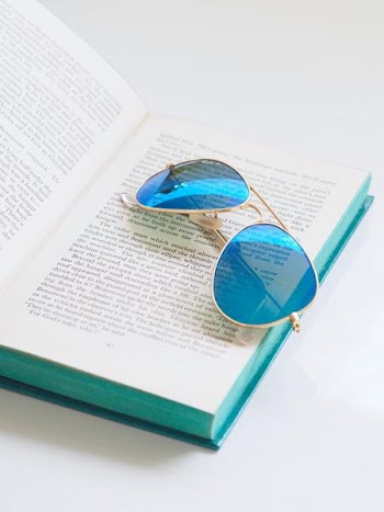 Free Photo of blue, sunglasses, book