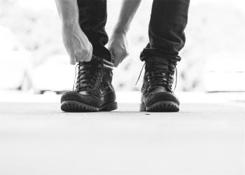 Free Photo of boots, laces, hands