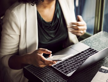 Free Photo of businesswoman, laptop, phone