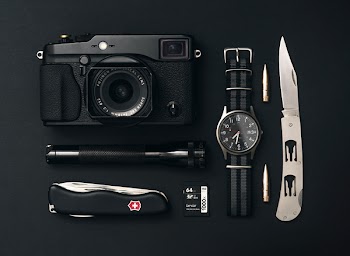 Free Photo of camera, watch, knife
