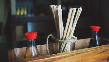 Free Photo of chopsticks, soy sauce, sushi