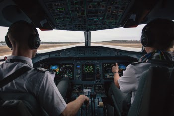 Free Photo of cockpit, pilot, people