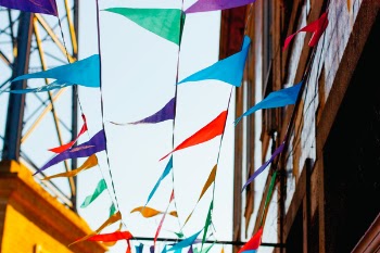 Free Photo of colorful, flaglets, building