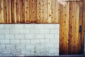 Free Photo of concrete, cinder blocks, wood paneling
