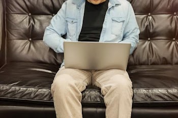 Free Photo of couch, man, laptop