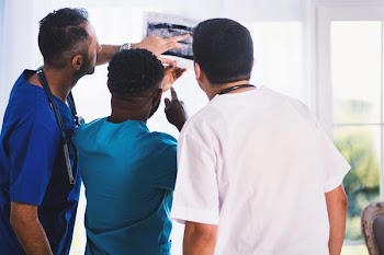 Free Photo of doctor, looking, xray