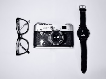 Free Photo of eyeglasses, camera, watch