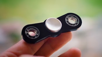 Free Photo of fidget spinner, hand, toy