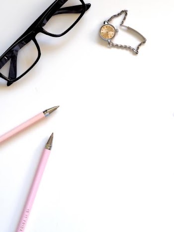 Free Photo of glasses, pens, watch