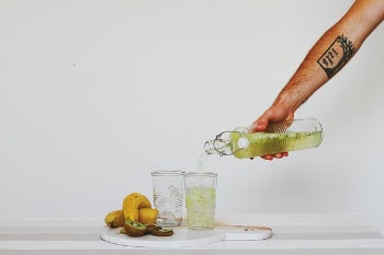 Free Photo of hand, glass, bottle