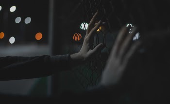 Free Photo of hands, bokeh, fence