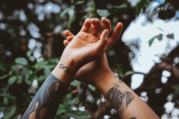 Free Photo of hands, tattoo, art