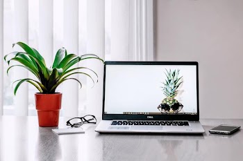 Free Photo of laptop, desk, glasses