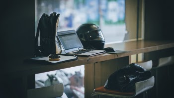 Free Photo of laptop, motorbike, helmet