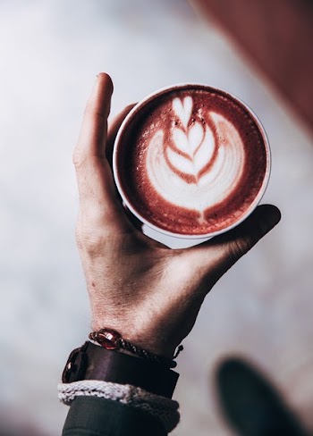 Free Photo of latte, art, hand
