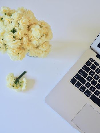 Free Photo of macbook, white, flowers