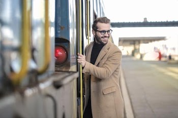 Free Photo of man, entering, train