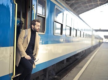 Free Photo of man, exiting, train