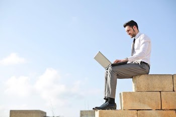 Free Photo of man, laptop, wall