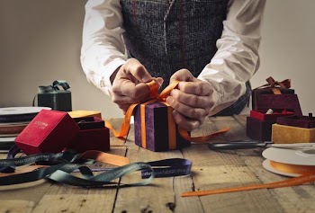 Free Photo of man, wrapping, gift