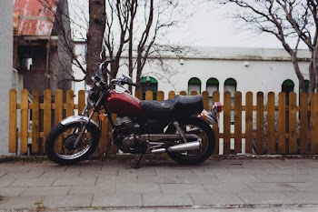 Free Photo of motorcycle, motorbike, picket fence