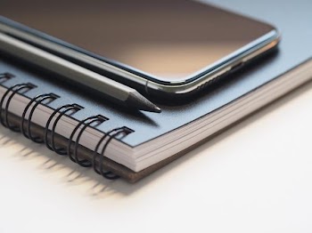 Free Photo of notepad, iphone, pencil