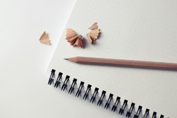 Free Photo of notepad, pencil, shavings