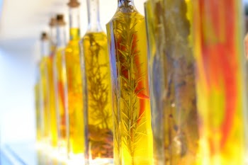 Free Photo of olive oil, jars, chili peppers