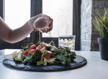 Free Photo of pouring, dressing, salad