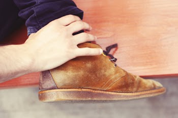 Free Photo of shoes, hands, jeans