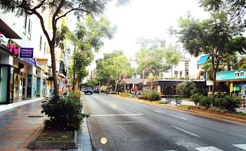 Free Photo of street, sidewalk, stores