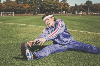 Free Photo of stretching, tracksuit, track and field