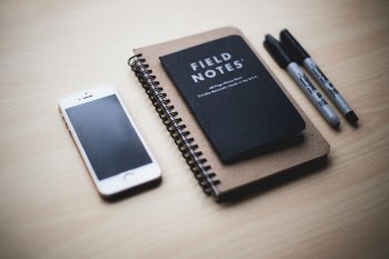 Free Photo of table, cellphone, notebook