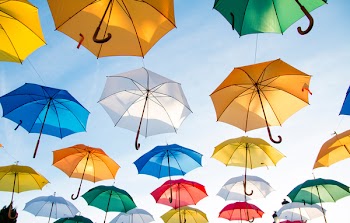 Free Photo of umbrellas, sky, sunshine