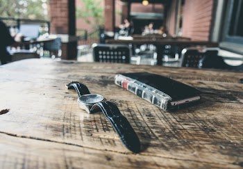 Free Photo of watch, book, table