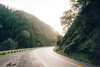 Free Photo of winding road, guard rail, rural